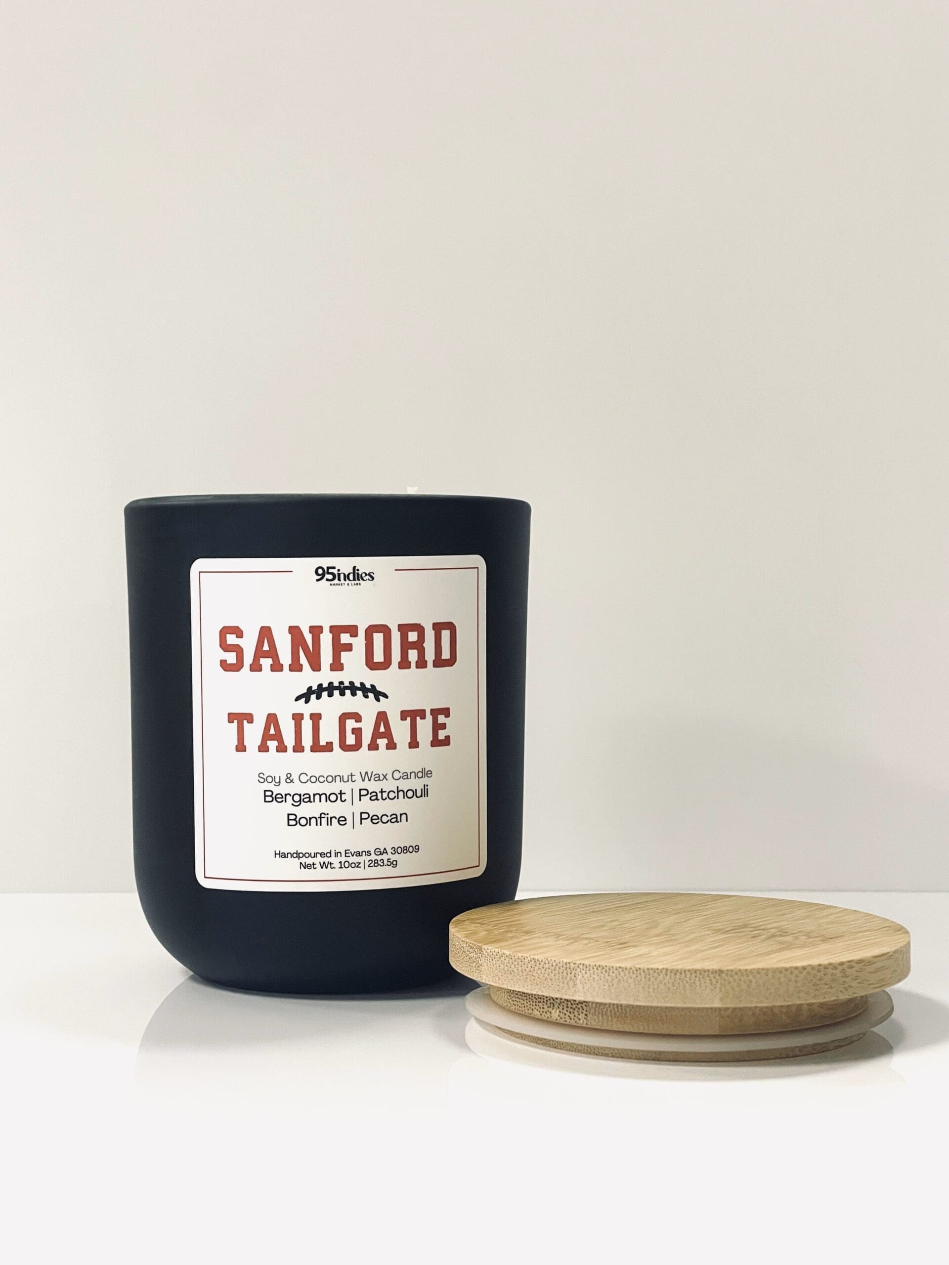 Sanford Tailgate Candle by 95indies – a 10oz soy and coconut wax candle crafted for spirited game days, tailgating vibes, elegant nights, and unique gifting, blended and hand-poured in Evans, Georgia. 10oz Sanford Tailgate candle by 95indies, featuring soy and coconut wax, handpoured in Evans, Georgia, for spirited game day, tailgating vibes, elegant nights, and unique gifting.