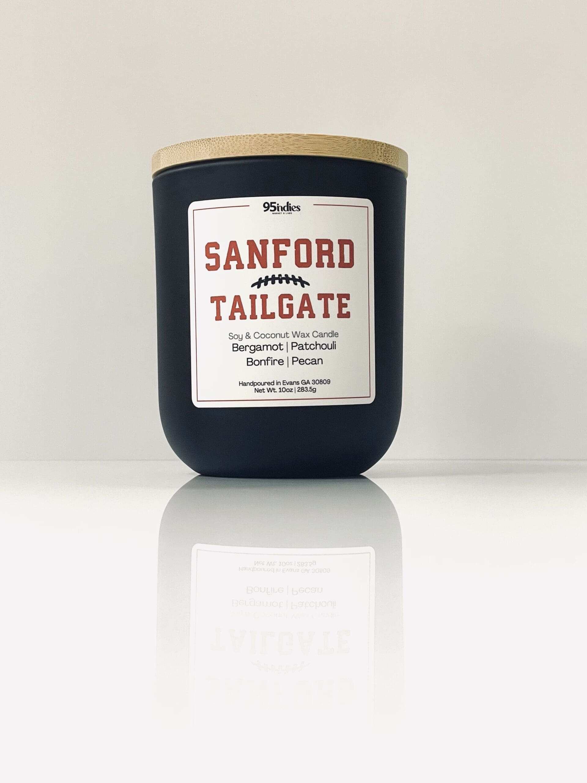 Sanford Tailgate Candle by 95indies – a 10oz soy and coconut wax candle crafted for spirited game days, tailgating vibes, elegant nights, and unique gifting, blended and hand-poured in Evans, Georgia. 10oz Sanford Tailgate candle by 95indies, featuring soy and coconut wax, handpoured in Evans, Georgia, for spirited game day, tailgating vibes, elegant nights, and unique gifting.