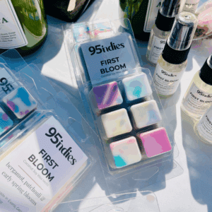 First Bloom wax melts by 95indies, photographed in spring sunlight with soft floral tones